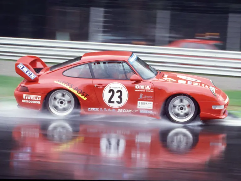 The Porsche races through the rain at Monza in 1998.