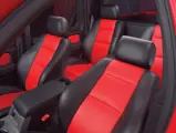Ford Sport Trac Adrenalin teaser: Adrenalin features four supportive bucket seats wrapped in red and black leather.