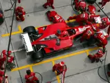 Mechanics replace the nosecone of the Ferrari 2001 allowing Michael Schumacher (GER) to take third place at the finish. Malaysian Grand Prix, Sepang Circuit, Kuala Lumpur, Malaysia. 17 March 2002.
