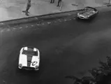 Pinto and his E-type chase down the 250 GT SWB Berlinetta 1613 GT at Luanda, Angola in 1962.