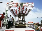 Patrick Tauziac and Claude Papin celebrate their victory at the 1990 Rallye Côte d’Ivoire Bandama.