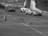  John von Neumann behind the wheel of chassis no. 0680 MDTR (race #11) leads an Aston Martin DB3S (race #59) and Richie Ginther behind the wheel of a Ferrari TR (race #211) into a turn at Pomona, February 1958.