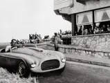 Chassis 0024, a 1949 Ferrari 166 MM Barchetta, hurtles round the street circuit of Playa Grande in Argentina, piloted by Carlos Menditeguy who would go on to take victory on 15 January 1950.