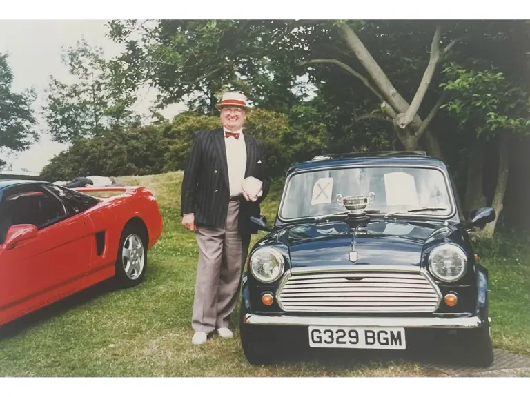 The consignor’s father standing proudly next to his Wood & Pickett Mini Margrave, having won an award at a car show in July 1992.