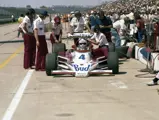 Johnny Rutherford competes at the 1979 Indianapolis 500 in his #4 McLaren M24B.
