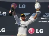 Lewis Hamilton celebrates his first win at the Hungarian Grand Prix in 2013, driving the W04 to triumph. Unbeknownst to many then, this victory would be a turning point, heralding the onset of Mercedes' dominance in the sport for the ensuing decade.