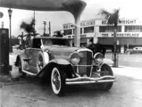 The Duesenberg at a Los Angeles gas station, 1941.