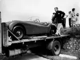 Clark Gable takes delivery of his brand new Jaguar XK 120 in 1953.