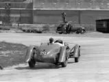 Rob Walker behind the wheel of ‘DUV 870’ at the 1939 BARC Meeting at Brooklands. Walker took 1st place at the Mountain Handicap event.