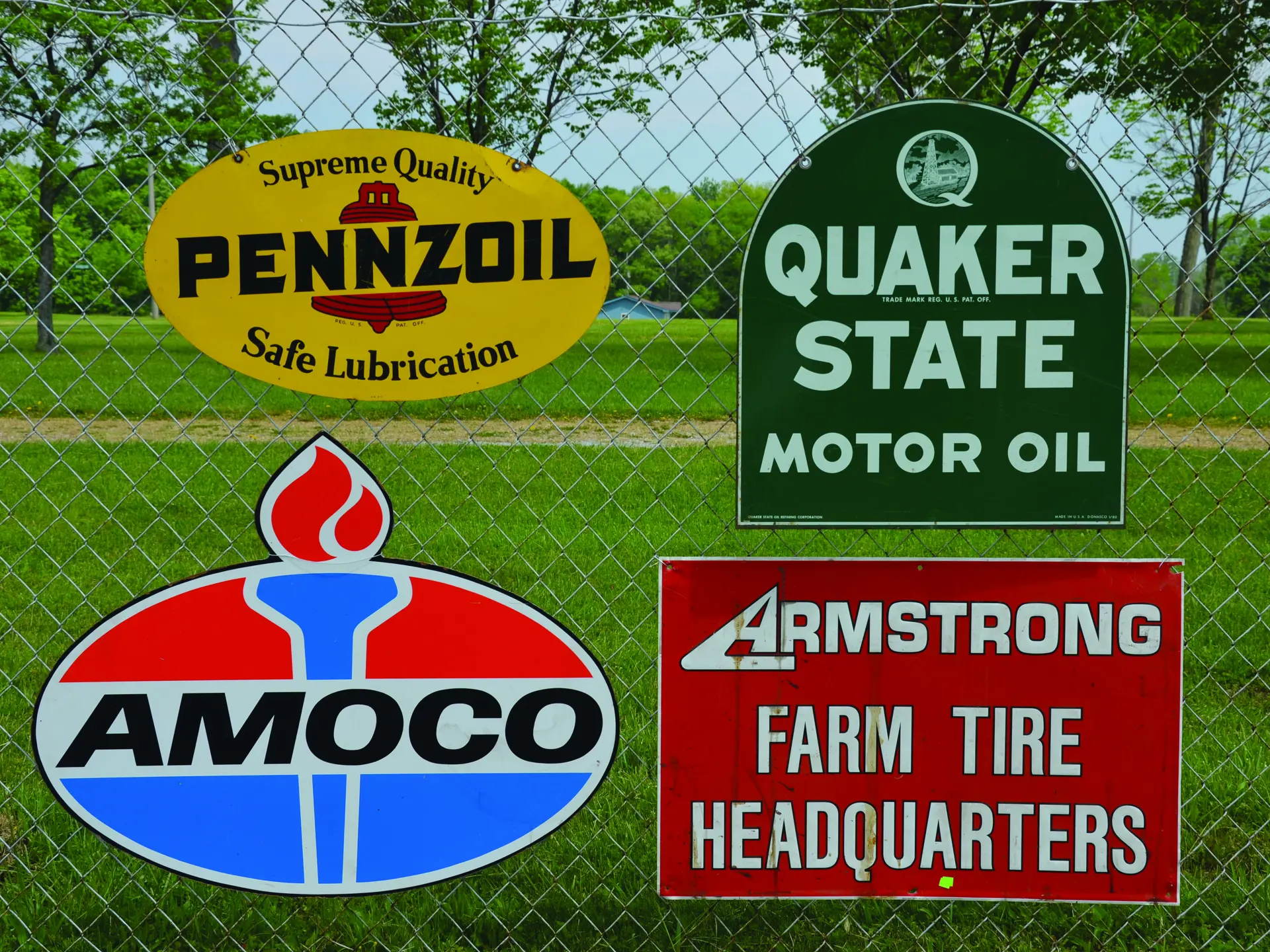 Pennzoil, Quaker State, Amoco and Armstrong Farm Tires signs Auburn