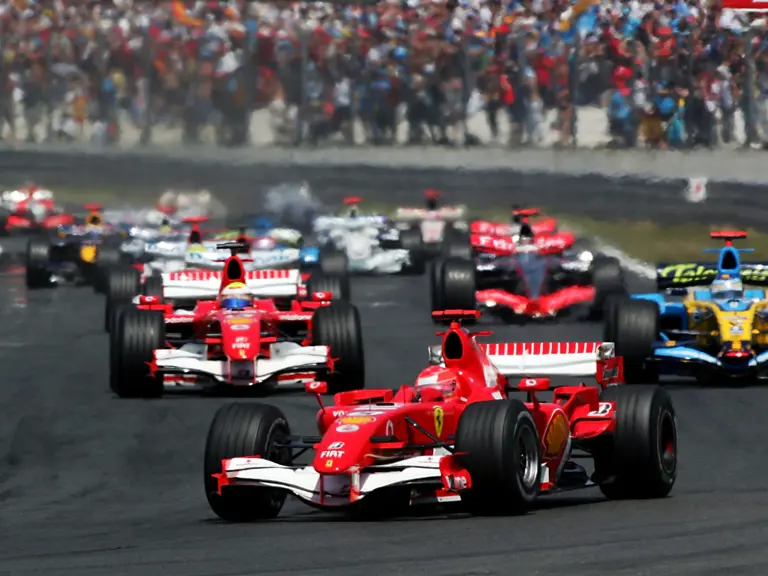 Michael Schumacher leads the field en route to a victory at the 2006 French Grand Prix.