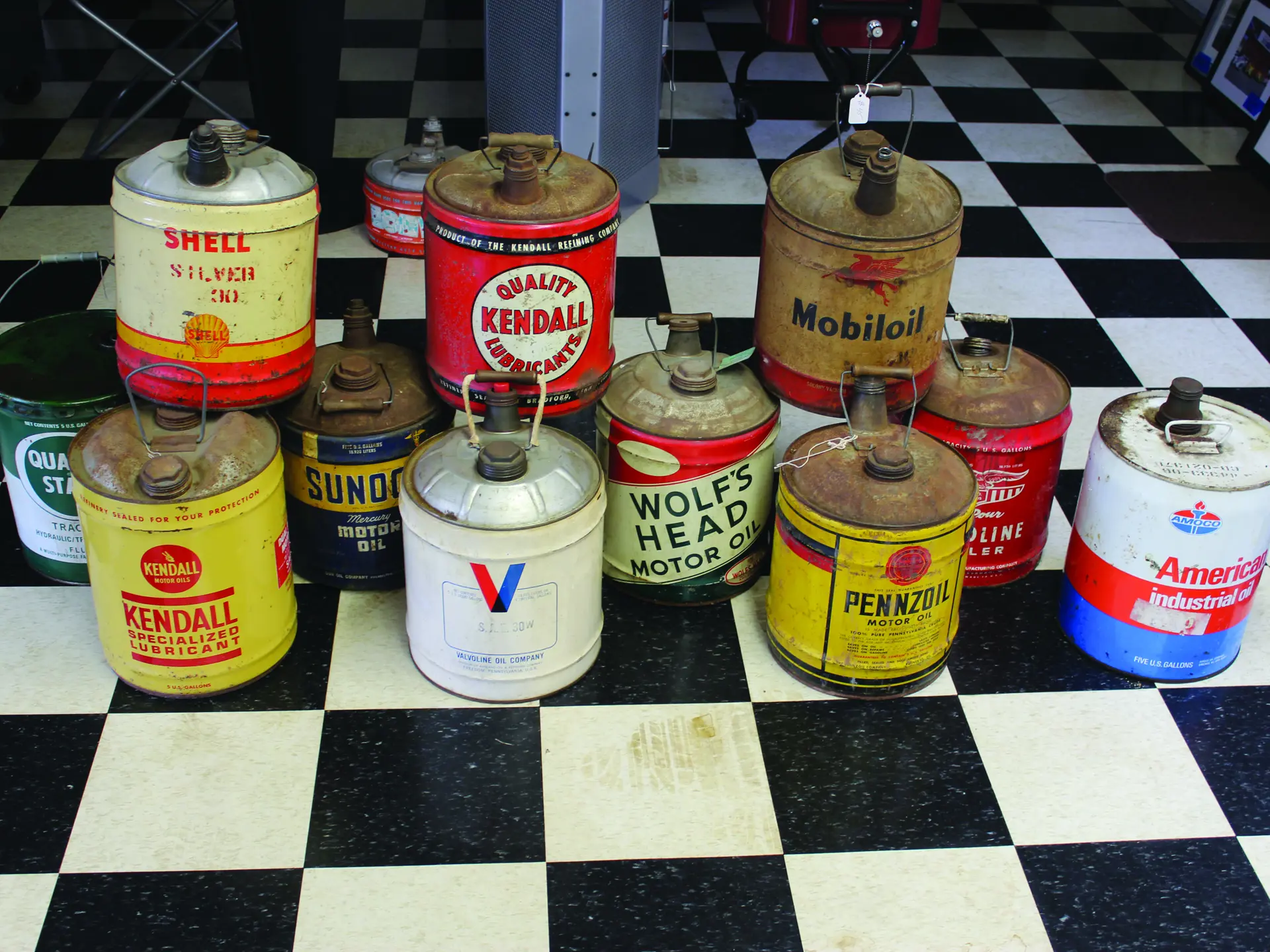 A mixed grouping of various, 5 gallon oil cans. | Fort Lauderdale 2017 ...