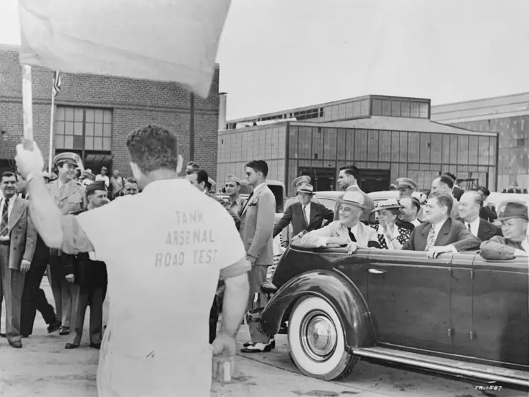 President Franklin D. Roosevelt, along with wife Eleanor and Chrysler President K.T. Keller, tour the Detroit Arsenal Tank Plant on September 18, 1942.