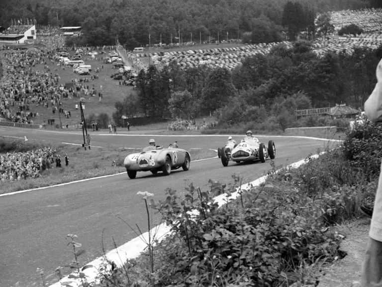 Arthur Legat’s Veritas Meteor chases Johnny Claes Gordini T16 through Eau Rouge at the 1952 Belgian Grand Prix.