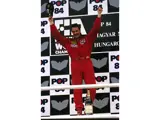 Nigel Mansell celebrates his victory at the Hungaroring on 13 August 1989.