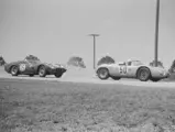 The RS 60 leads the Ferrari 250 TRI 61 of Mairesse, Ginter, and von Trips at the 1961 12 Hours of Sebring.