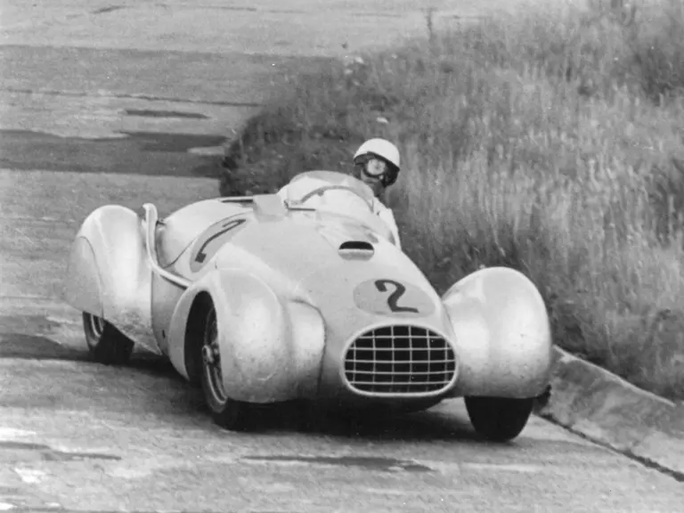 Captured here in its two-seater body configured with removable cycle-wings, Ulmen drove the Grossmutter to 2nd place finish at the 1952 ADAC Eifelrennen.