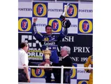 Race winner Nigel Mansell (GBR) Williams celebrates on the podium.
Formula One World Championship, Rd9, British Grand Prix, Silverstone, 12 July 1992.