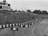 The #4 McLaren of Johnny Rutherford leads the pack around the Atlanta International Raceway.